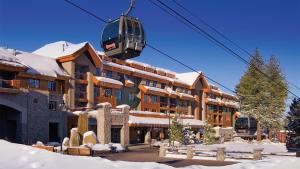 RTNS1A-2314_GrandResidenceLakeTahoe_exterior_skilift_GRC-P-097_16_9